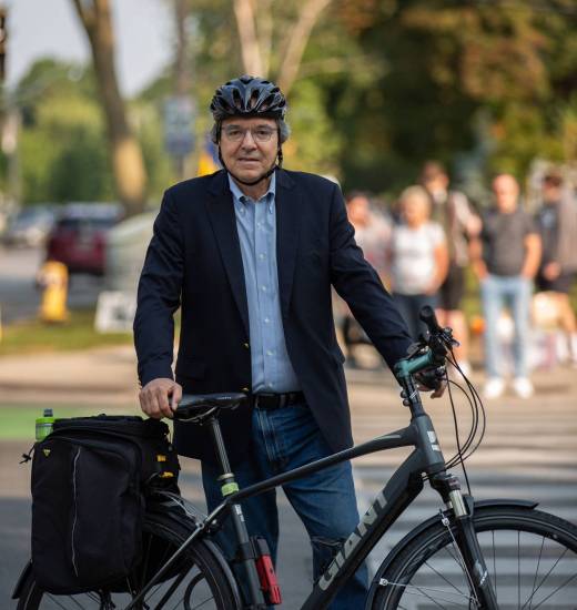 Gil Penalosa with bike in Toronto